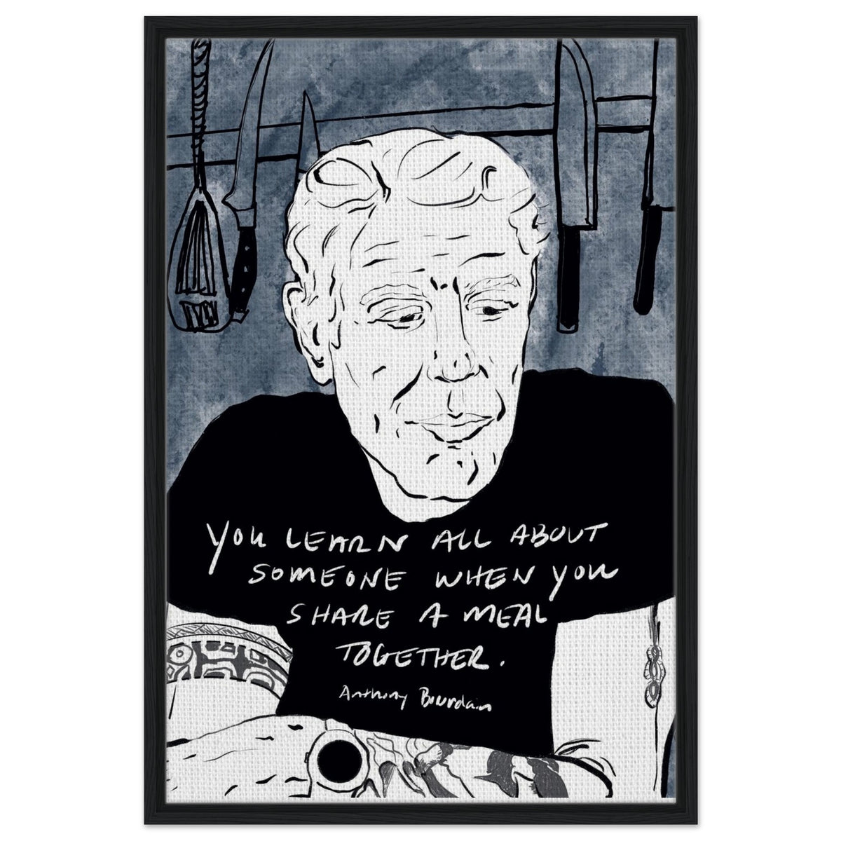 Black and white Anthony Bourdain portrait framed canvas print with blue textured background and quote about sharing meals, perfect kitchen and dining room wall art for food lovers and chefs.