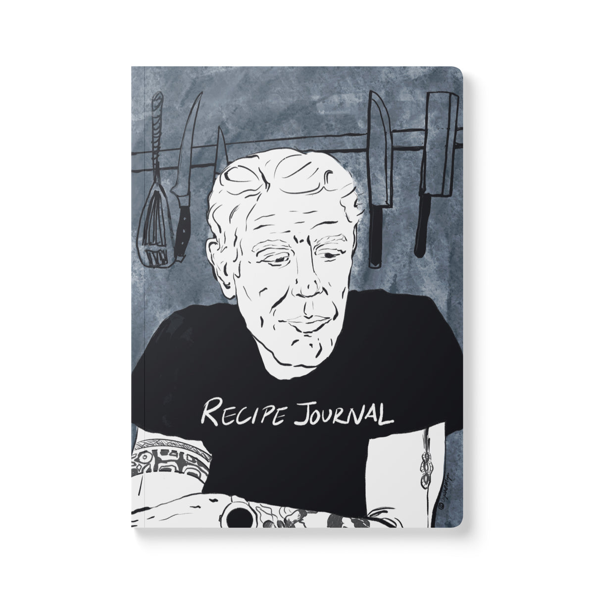 Anthony Bourdain cooking journal with tattooed arms portrait
