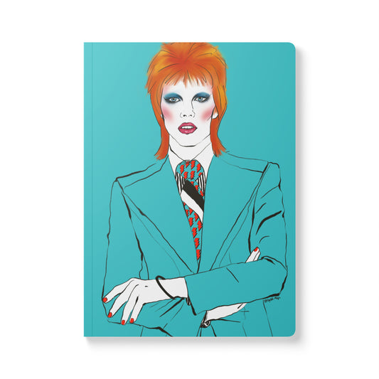 Bowie-inspired pop art softcover journal with dramatic glam portrait against a vivid teal blue background