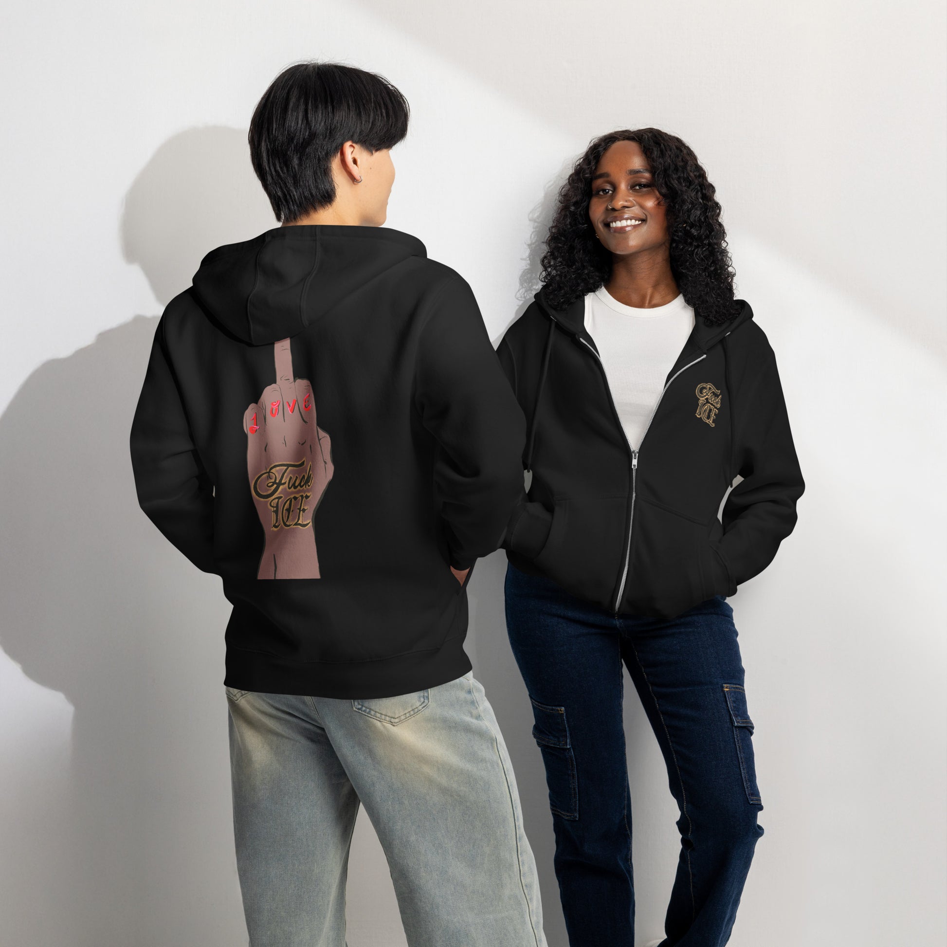 Unisex activist zip‑up sweatshirt with bold anti‑ICE artwork
