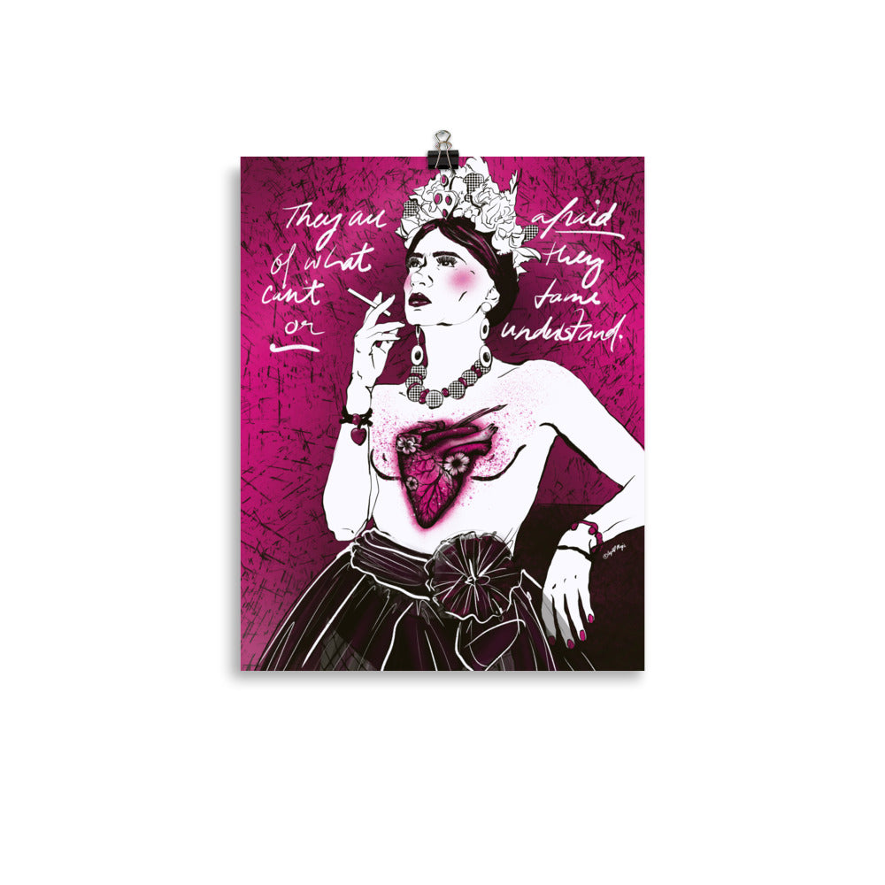 Black and white Frida portrait with fuchsia accents and tattoo heart
