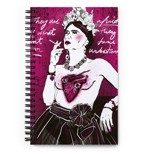 Black‑and‑white portrait notebook with fuchsia accents and tattoo heart
