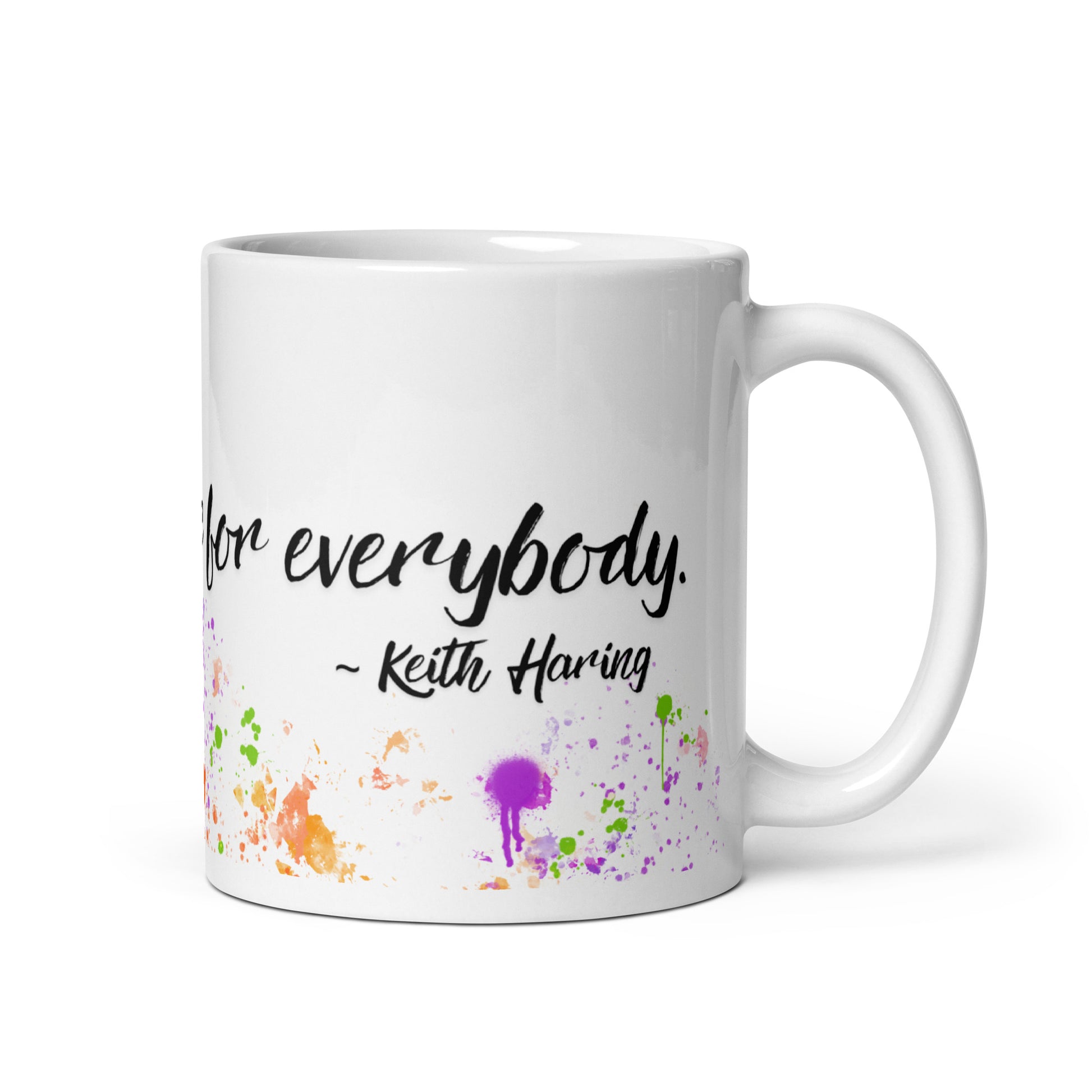 Black and white Keith Haring mug with bright green shirt